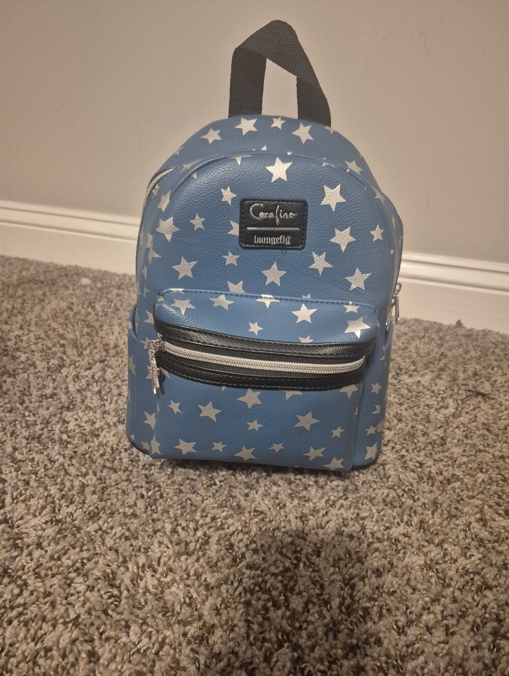 Loungefly coraline stars backpack